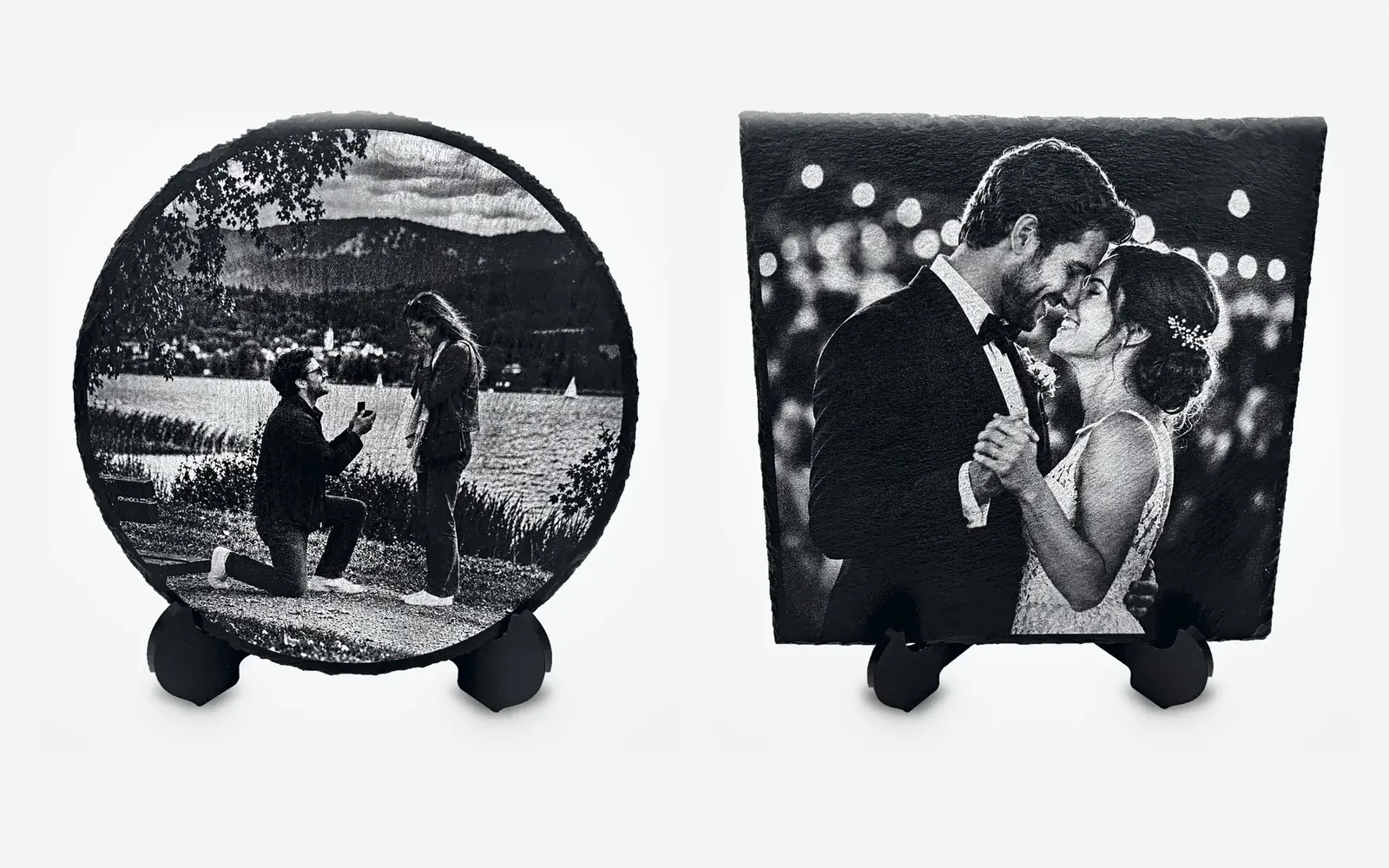 Two laser engraved slates: a marriage proposal by a lake on a round slate, and a newly married couple's first dance on a square slate